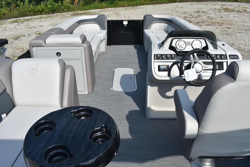 Slide: The Image of 2026 Godfrey Sweetwater SW 2286 C pontoon boat interior with modern helm and seating. - 2