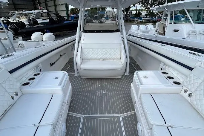 Slide: The Image of 2017 Intrepid boat interior with white seating and sleek design. - 10