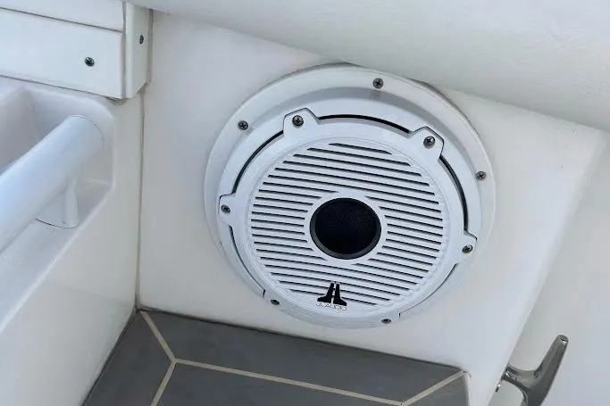 Slide: The Image of White speaker installed on a 2017 Intrepid boat interior wall. - 11