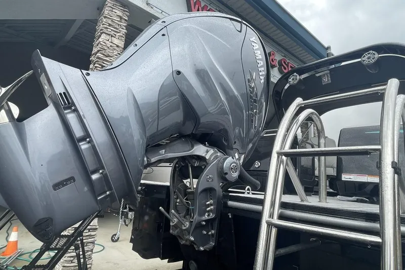 Slide: The Image of 2025 G 3 Amara boat with Yamaha outboard motor and metal ladder. - 2