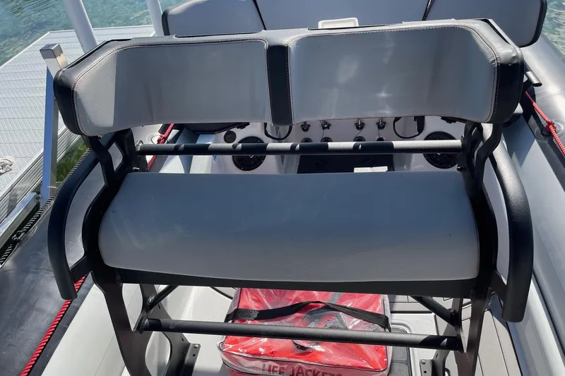 Slide: The Image of 2019 Zodiac Open 7 boat interior with seating and life jackets visible. - 15