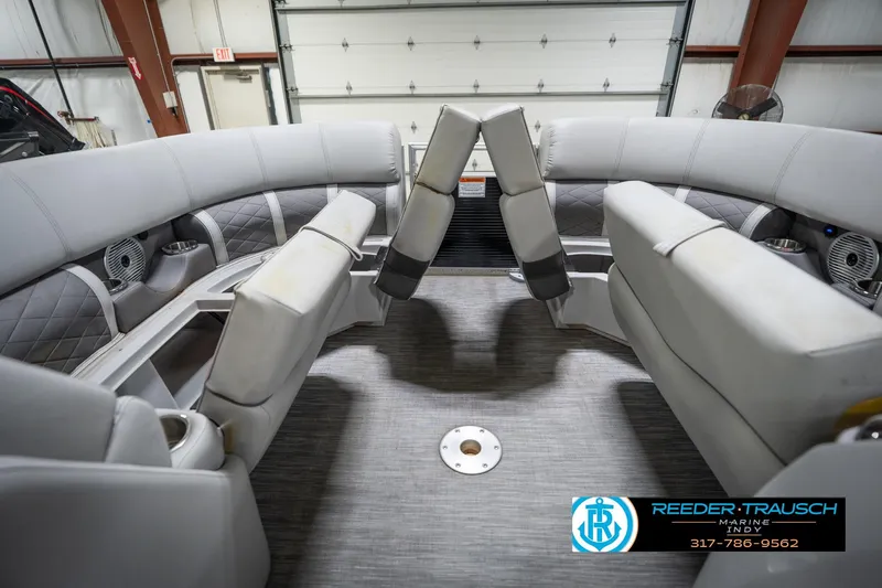 Slide: The Image of 2023 Bennington 22 LSR boat interior with plush seating and modern design. - 22
