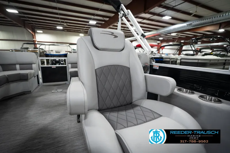 Slide: The Image of Luxurious seating on 2023 Bennington 22 LSR pontoon boat, featuring elegant design and comfort. - 28