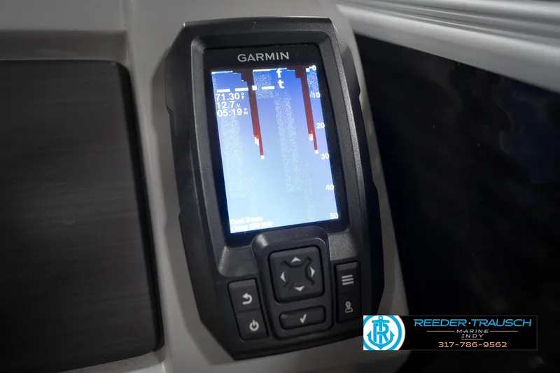 Slide: The Image of Garmin display on 2023 Bennington 22 LSR boat dashboard, showing temperature and voltage. - 36