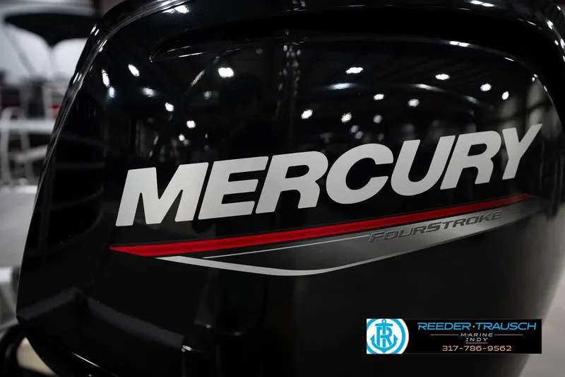 Slide: The Image of Mercury FourStroke engine on 2023 Bennington 22 LSR boat, Reeder-Trausch Marine logo visible. - 48
