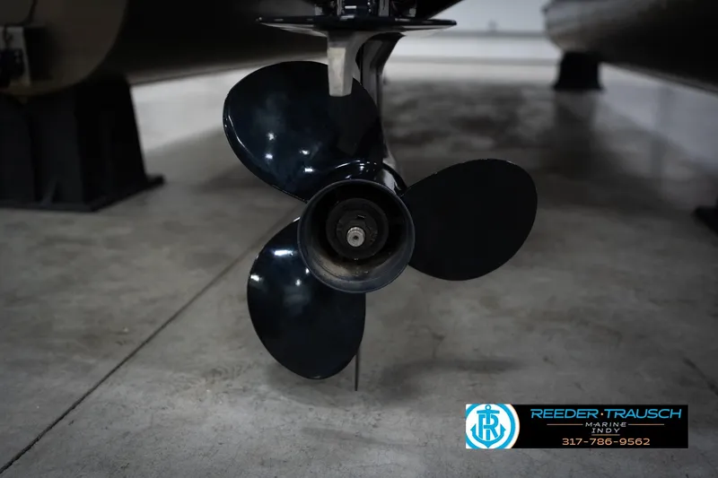 Slide: The Image of Close-up of a 2023 Benington 22 LSR boat propeller in a showroom. - 50
