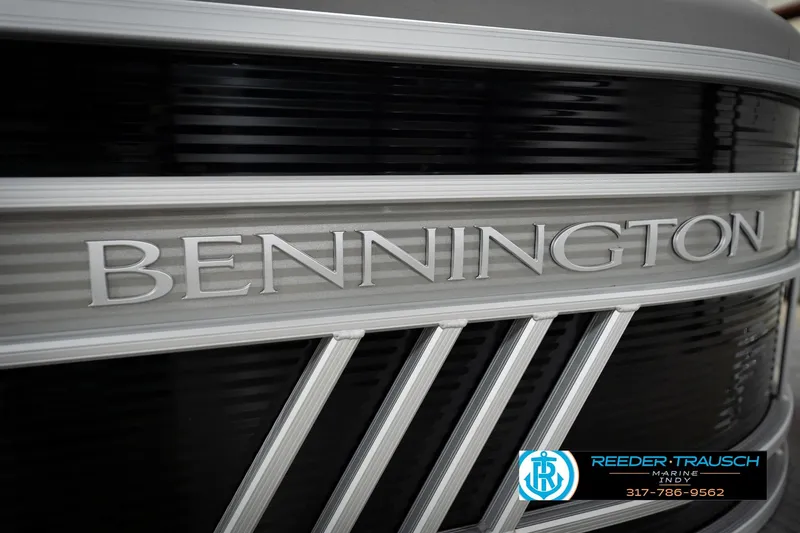 Slide: The Image of 2023 Bennington 22 LSR boat grille with logo and dealership contact information. - 52