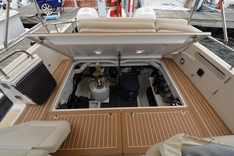 Slide: The Image of 2020 MJM 43z yacht engine compartment with open hatch, docked at marina. - 16