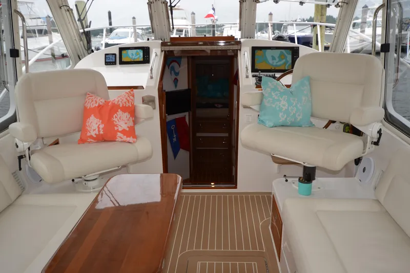 Slide: The Image of Interior of 2020 MJM 43z yacht with plush seating and nautical decor. - 18