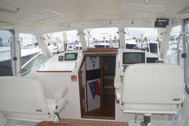 Slide: The Image of Interior view of a 2020 MJM 43z yacht cockpit with navigation equipment. - 21