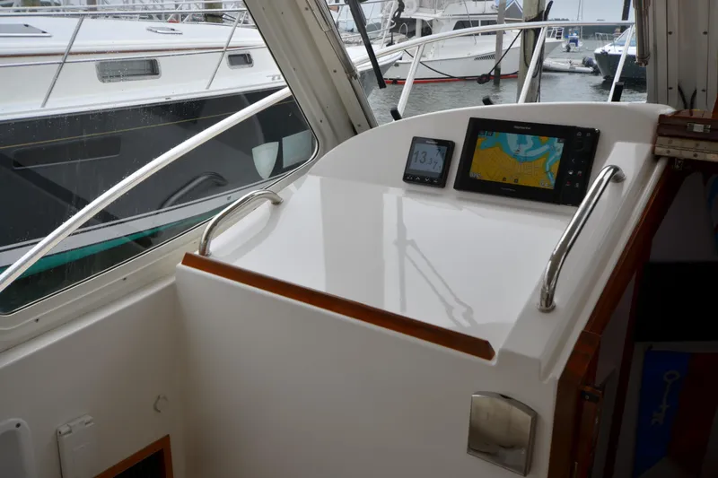 Slide: The Image of Helm station of 2020 MJM 43z yacht with navigation displays and controls. - 25