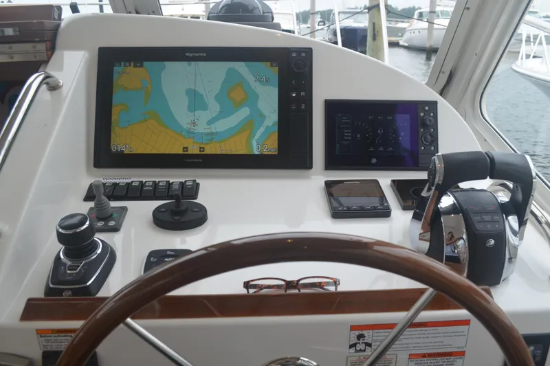 Slide: The Image of Helm of 2020 MJM 43z yacht with navigation screens and controls. - 27