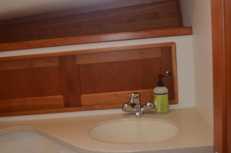 Slide: The Image of Wooden cabinet and sink in 2020 MJM 43z boat bathroom. - 37