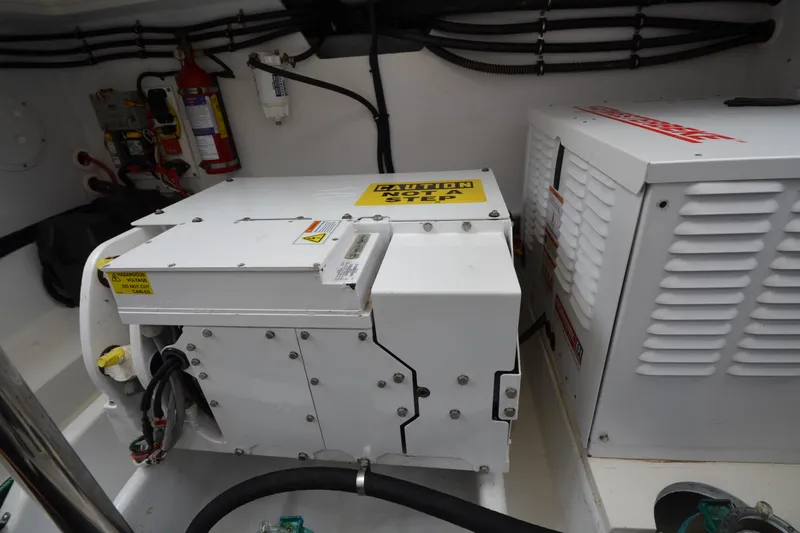 Slide: The Image of Engine room of 2020 MJM 43z boat with equipment and safety features. - 52