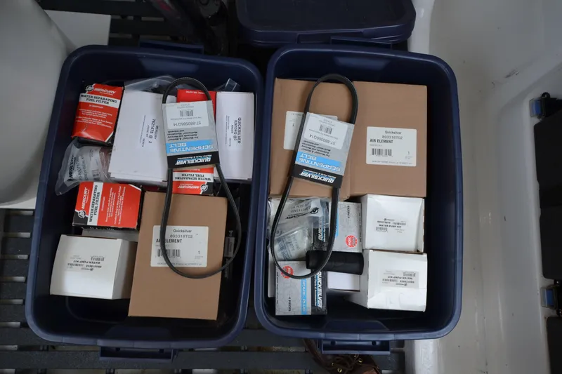 Slide: The Image of Boxes of boat parts and accessories in storage bins for MJM 43z, 2020 model. - 56