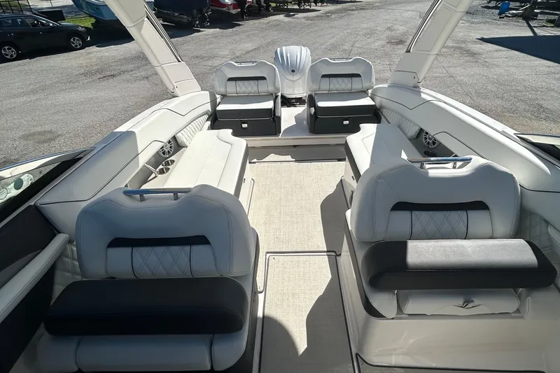 Slide: The Image of 2023 Regal LX6 boat interior with luxurious seating and modern design. - 9