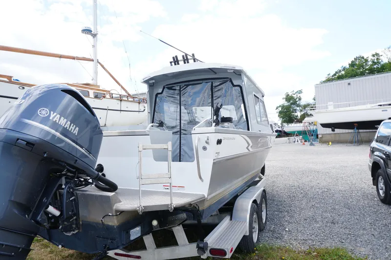 Slide: The Image of 2023 Weldcraft Ocean King 220 boat with Yamaha outboard motor on trailer. - 25