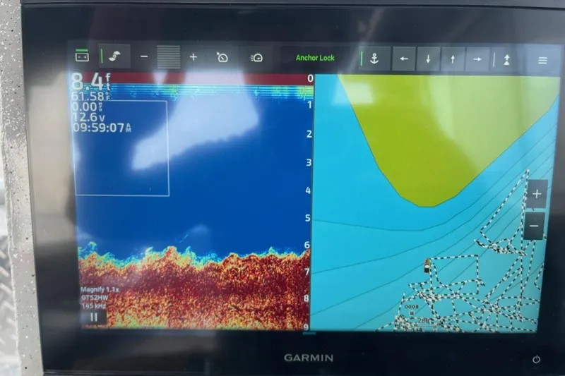 Slide: The Image of Garmin marine display on Weldcraft Ocean King 220, showing sonar and navigation data. - 15