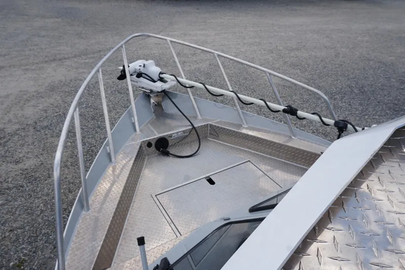 Slide: The Image of 2023 Weldcraft Ocean King 220 boat deck with railing and mounted equipment. - 55