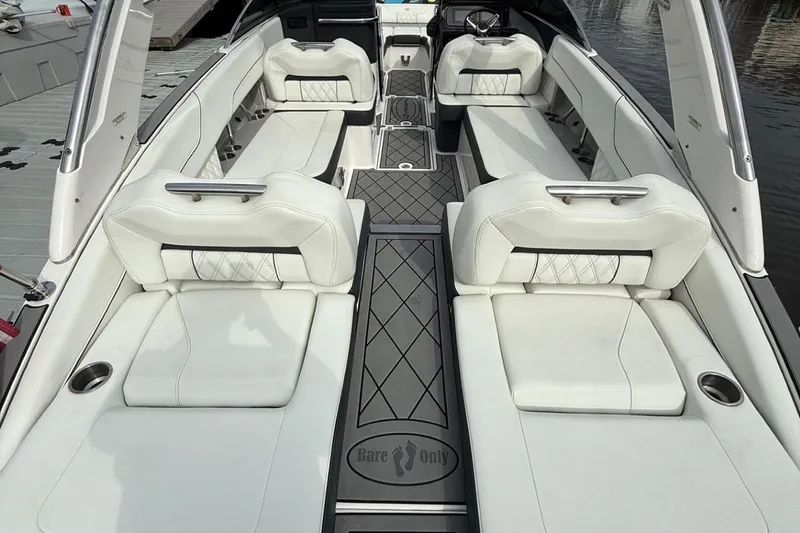 Slide: The Image of Luxurious interior of 2021 Regal LS6 boat with white seating and elegant design. - 11
