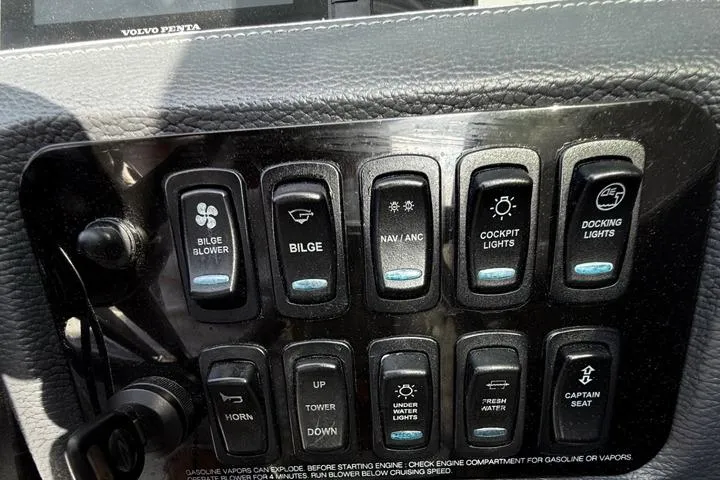 Slide: The Image of Control panel of a 2021 Regal LS6 boat with various switches and labels. - 4