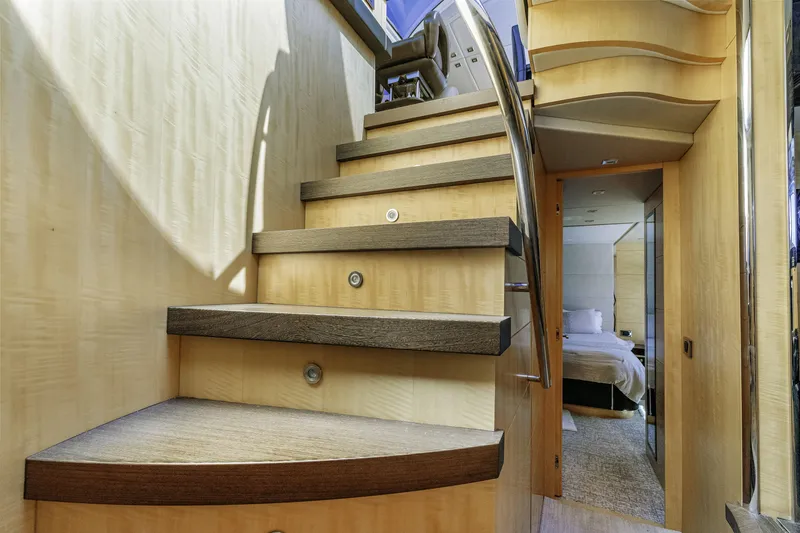 Slide: The Image of Interior staircase of 2014 Sunseeker 68 Sport Yacht, leading to a luxurious bedroom. - 20