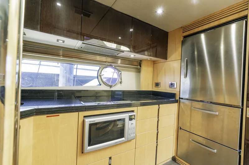 Slide: The Image of Modern kitchen interior of 2014 Sunseeker 68 Sport Yacht with stainless steel appliances. - 27