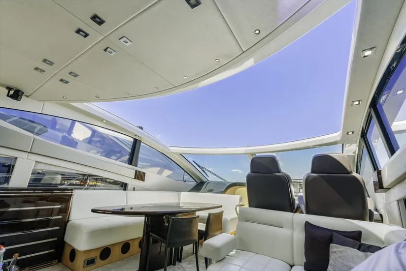 Slide: The Image of Luxurious interior of 2014 Sunseeker 68 Sport Yacht with panoramic roof and elegant seating. - 31