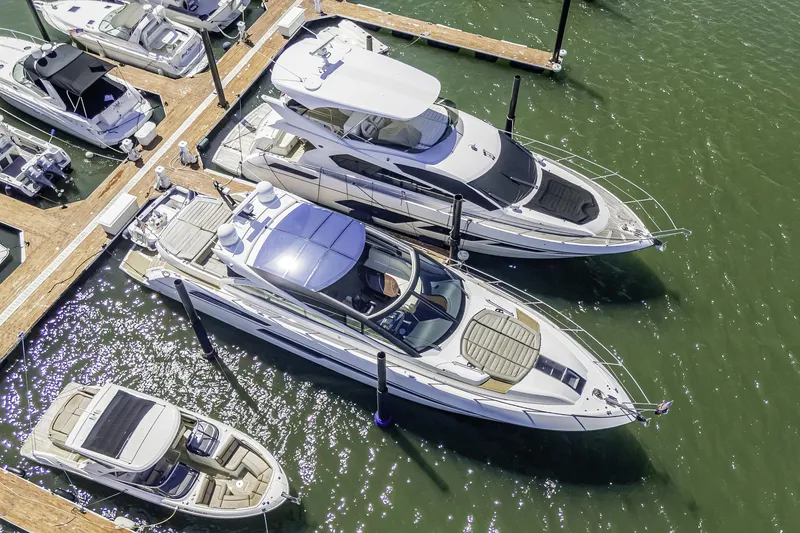 Slide: The Image of Aerial view of 2014 Sunseeker 68 Sport Yacht docked among other boats. - 5