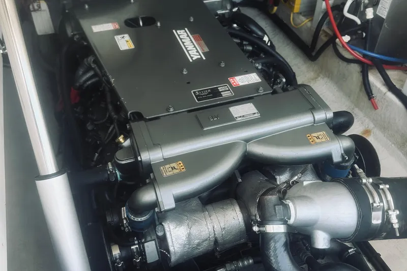 Slide: The Image of Engine compartment of a 2013 Back Cove 30 boat featuring a Yanmar engine. - 40