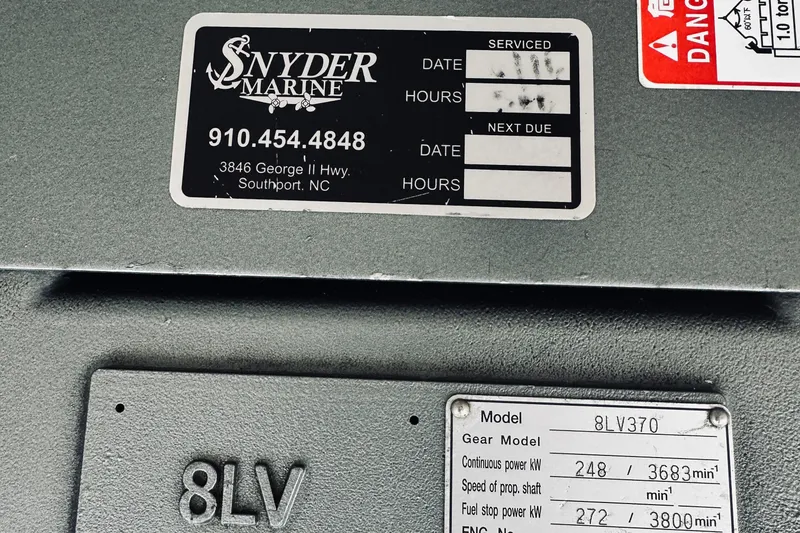 Slide: The Image of 2013 Back Cove 30 engine details with Snyder Marine service label, Southport, NC. - 42