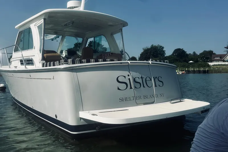 Slide: The Image of 2013 Back Cove 30 boat named "Sisters" docked at Shelter Island, NY. - 5