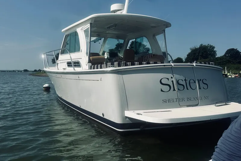 Slide: The Image of 2013 Back Cove 30 boat named "Sisters" on water near Shelter Island, NY. - 63