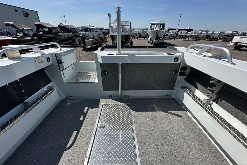 Slide: The Image of 2025 Hewescraft 190 Sea Runner ET interior, showcasing spacious deck and storage features. - 10