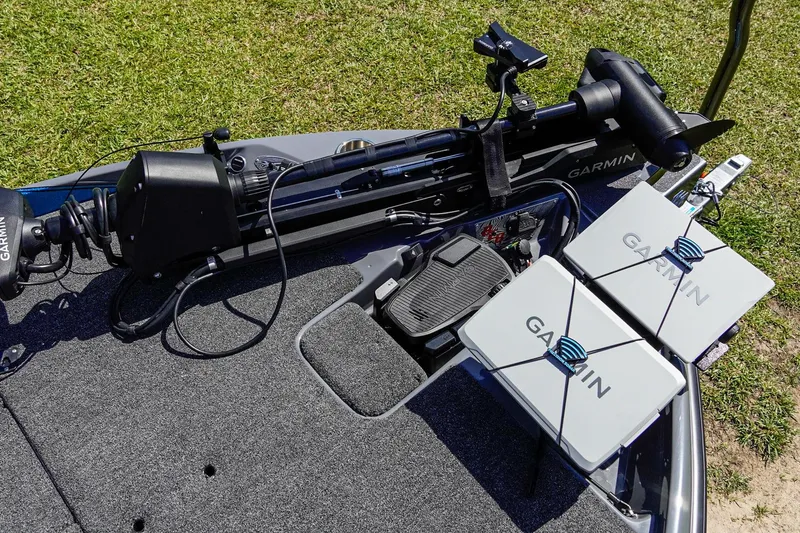 Slide: The Image of 2025 Bass Cat Puma STS boat with Garmin electronics and trolling motor on deck. - 19