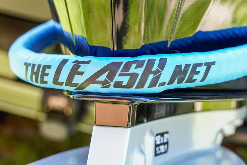 Slide: The Image of 2025 Bass Cat Puma STS with TheLeash.net accessory, close-up view. - 28