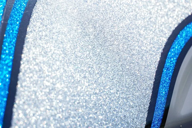 Slide: The Image of Close-up of 2025 Bass Cat Puma STS with sparkling blue and silver finish. - 39