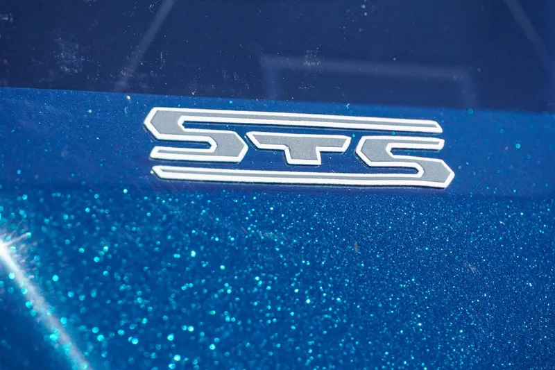 Slide: The Image of 2025 Bass Cat Puma STS logo on sparkling blue surface. - 42