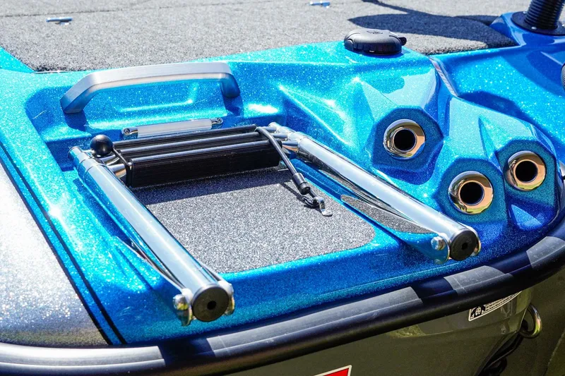 Slide: The Image of 2025 Bass Cat Puma STS boat with metallic blue finish and chrome details. - 46