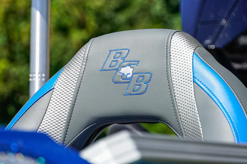Slide: The Image of 2025 Bass Cat Puma STS seat with blue and gray design, featuring embroidered logo. - 49