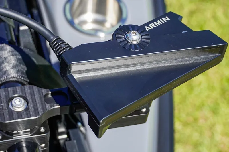 Slide: The Image of Close-up of a Garmin device on a 2025 Bass Cat Puma STS boat. - 51