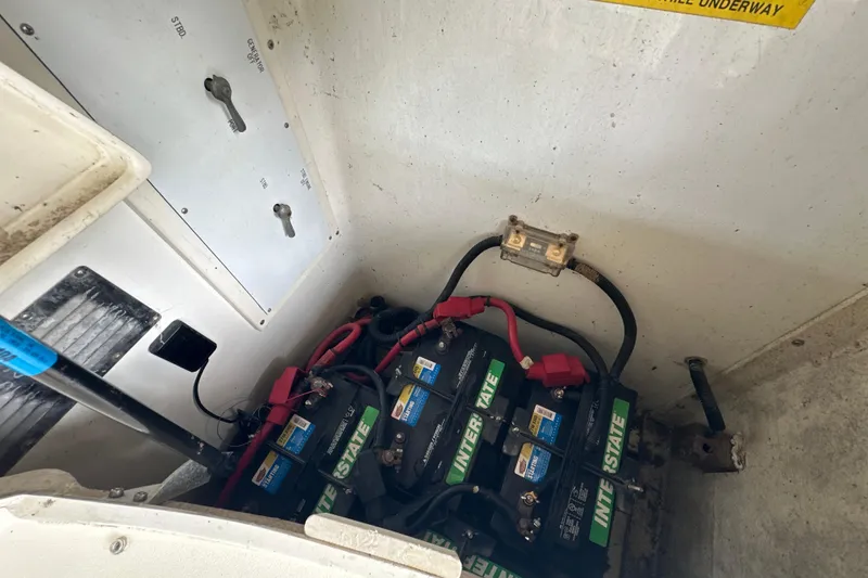 Slide: The Image of Battery compartment of a 1995 Sea Ray 440 Express Bridge with Interstate batteries. - 18