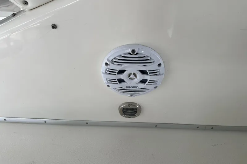 Slide: The Image of Kenwood speaker on 1995 Sea Ray 440 Express Bridge boat interior. - 33