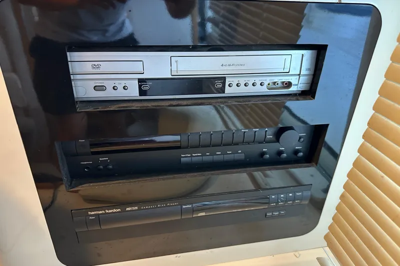 Slide: The Image of Built-in entertainment system on a 1995 Sea Ray 440 Express Bridge yacht. - 50