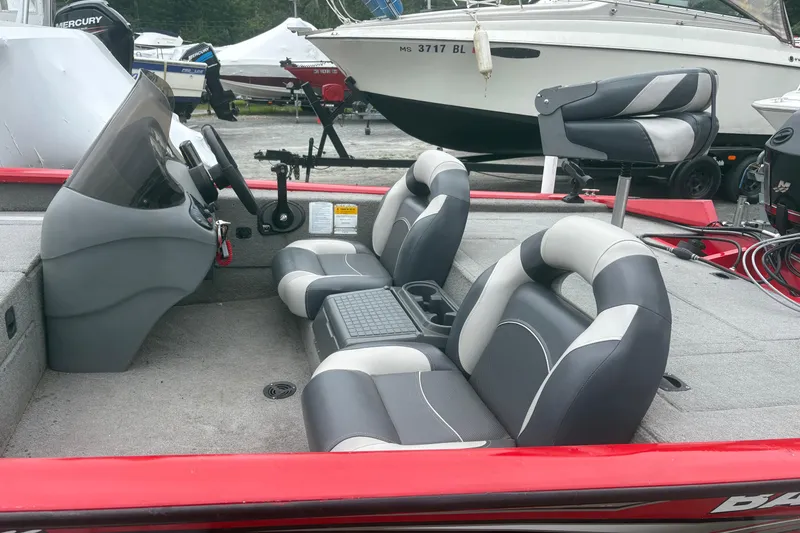 Slide: The Image of 2008 Tracker Pro Team 175 TXW boat interior with gray and black seating. - 5