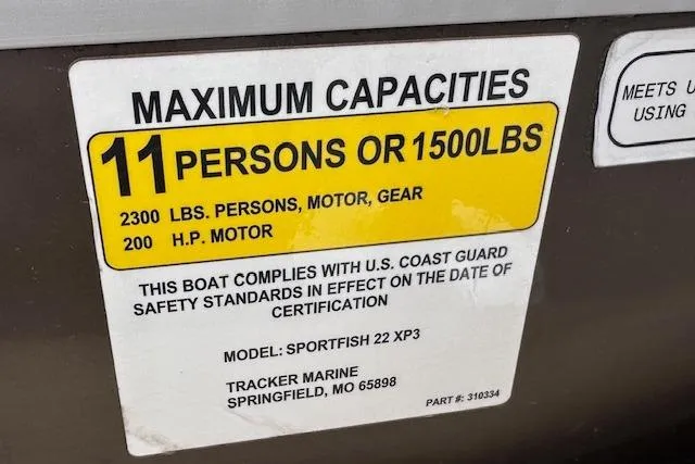 Slide: The Image of Maximum capacity label for 2018 Sun Tracker SportFish 22 XP3, 11 persons or 1500 lbs. - 30