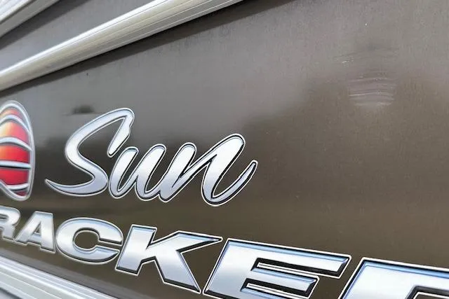 Slide: The Image of Close-up of 2018 Sun Tracker SportFish 22 XP3 logo on metallic surface. - 33