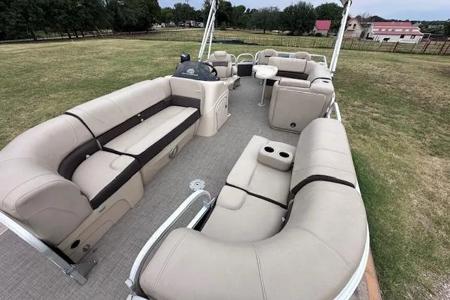Slide: The Image of 2018 Sun Tracker SportFish 22 XP3 pontoon boat with spacious seating and modern design. - 6