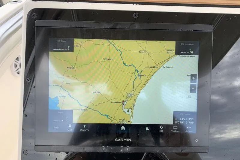 Slide: The Image of Garmin GPS display on 2026 Bulls Bay 255CC boat, showing coastal navigation map. - 20