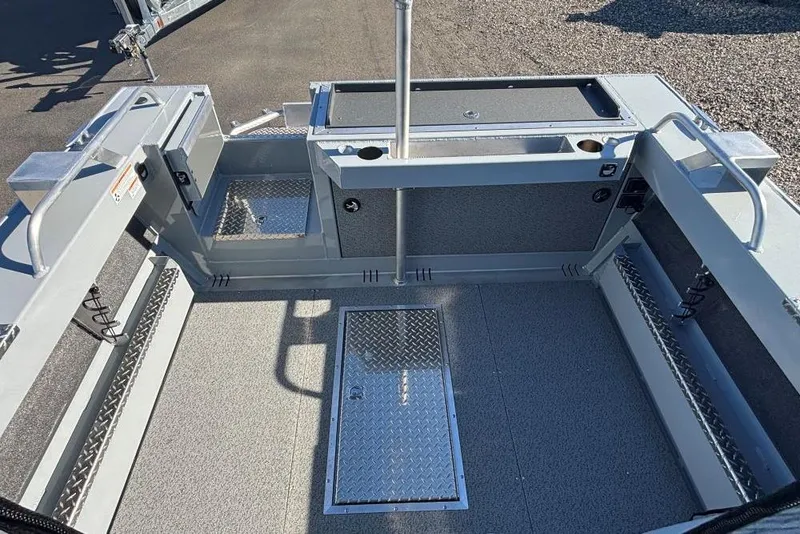 Slide: The Image of 2025 Hewescraft 190 Sea Runner ET boat interior with storage compartments and non-slip flooring. - 9